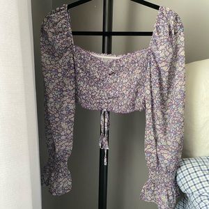 Boho off the shoulder, long sleeve shirt.